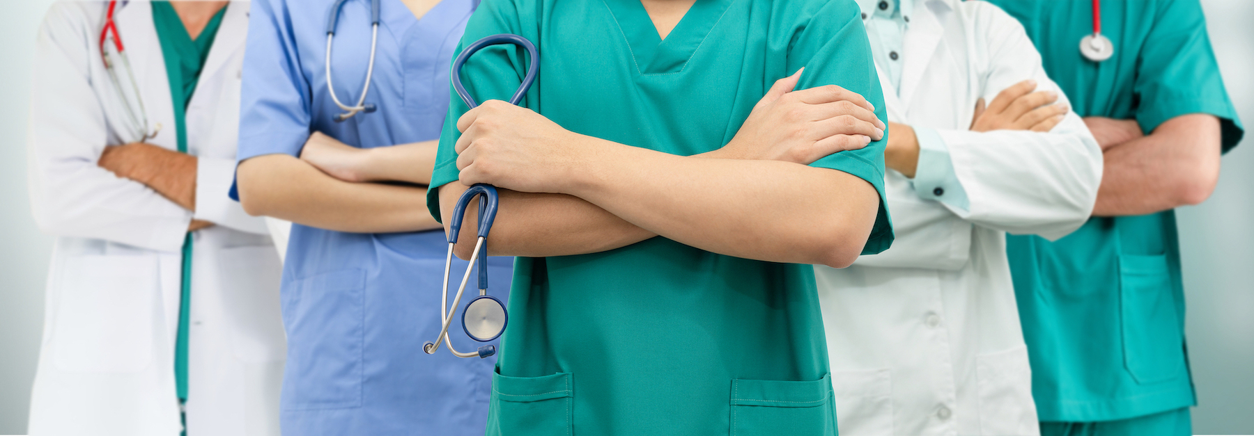 Doctor Working In Hospital With Other Doctors. Doctors at hospital working with other doctor. Healthcare medical and doctor staff services.